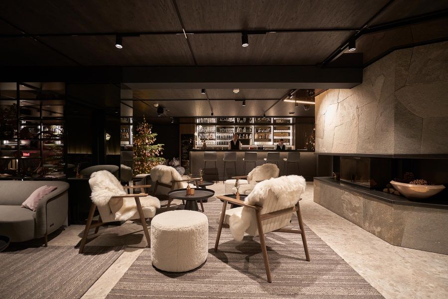 Interior design of the lobby & bar at the Triforet Alpin Resort